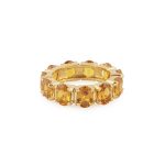 Anel em prata dourada e cristais cor amarelo ambar (Daisy Collection)